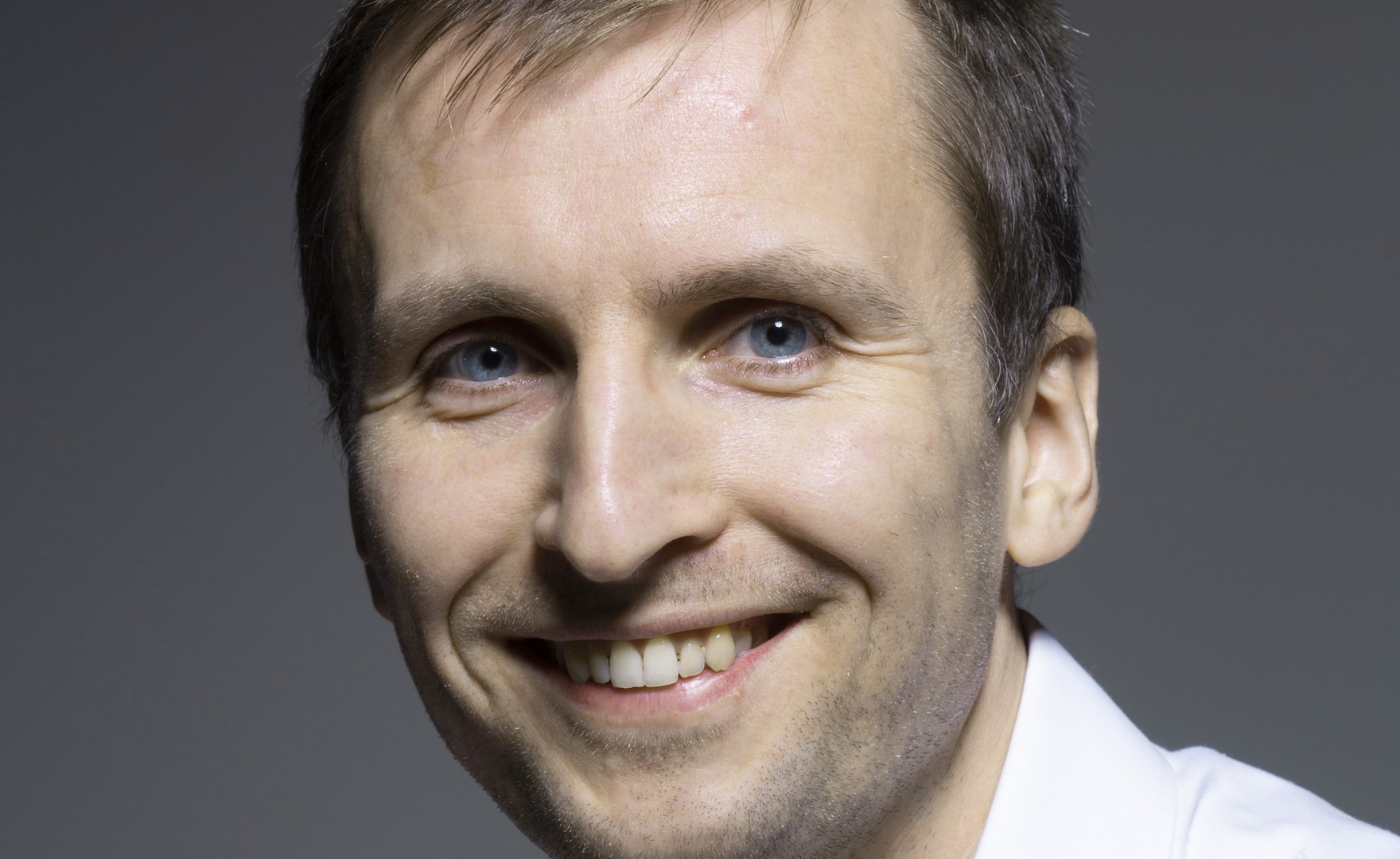 Portrait photograph of Evgeny Shadchnev, PD graduate