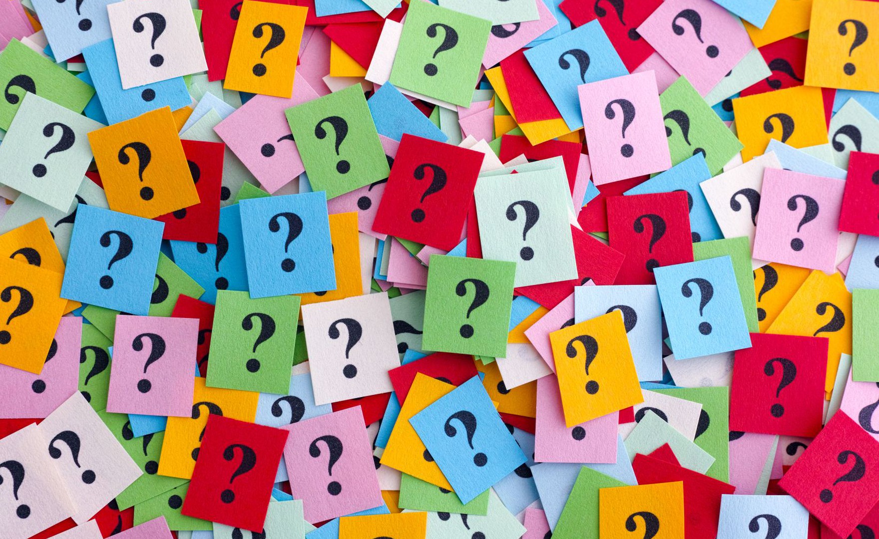 Colourful cards with question marks printed on them